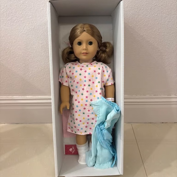 American Girl Doll in Starry Pink Dress with Light Blue Blanket